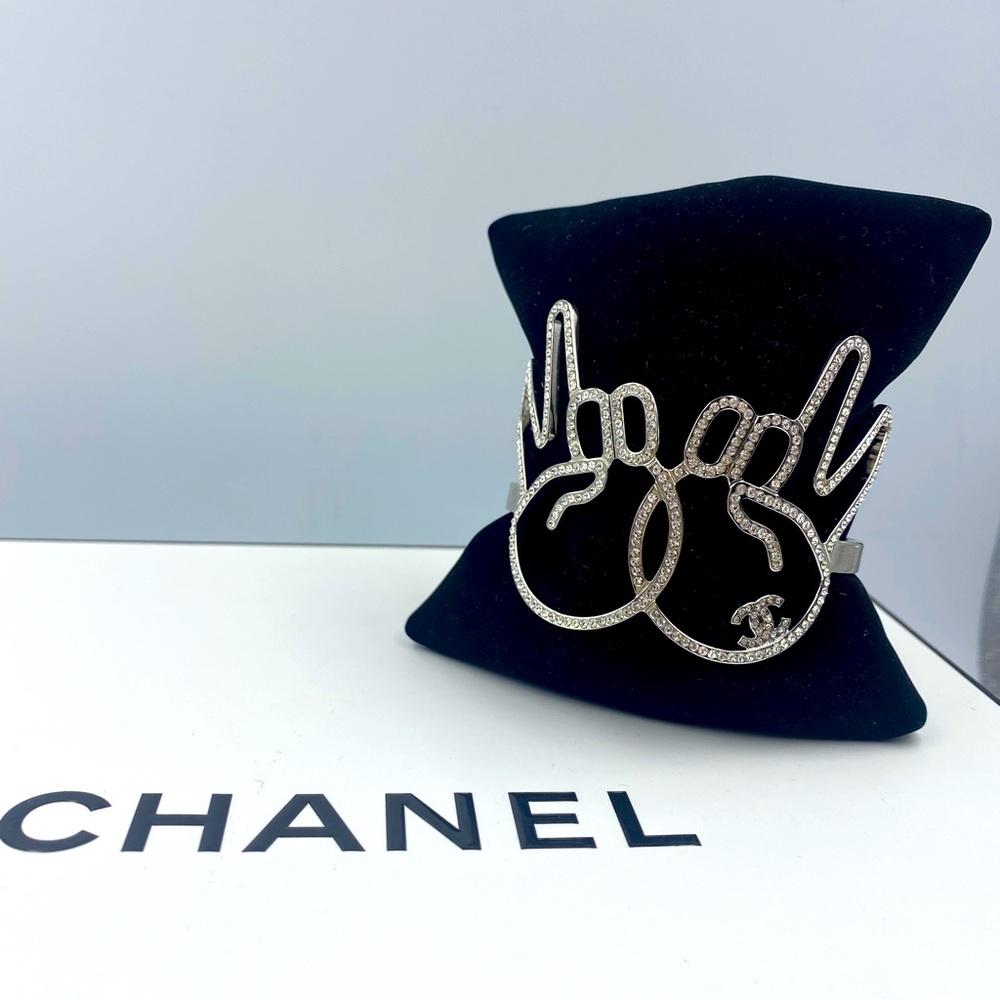 Authentic Chanel crystal filled peace Bangle bracelet runway fashion show